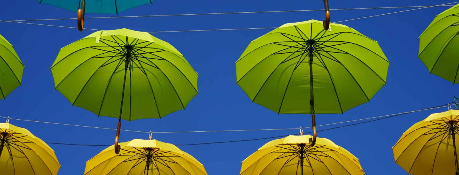 Umbrellas hanging in the sky